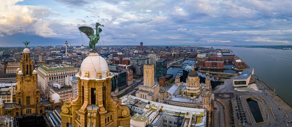 Historic skyline, Liver Bird, waterfront, city.